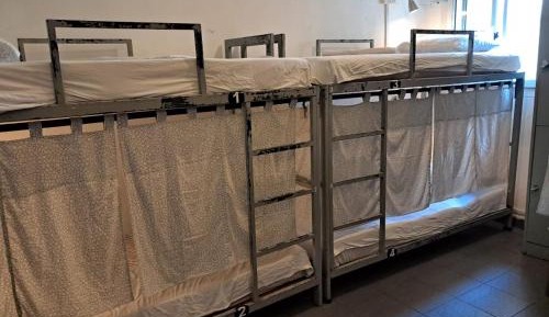 Single Bed in Dormitory Room